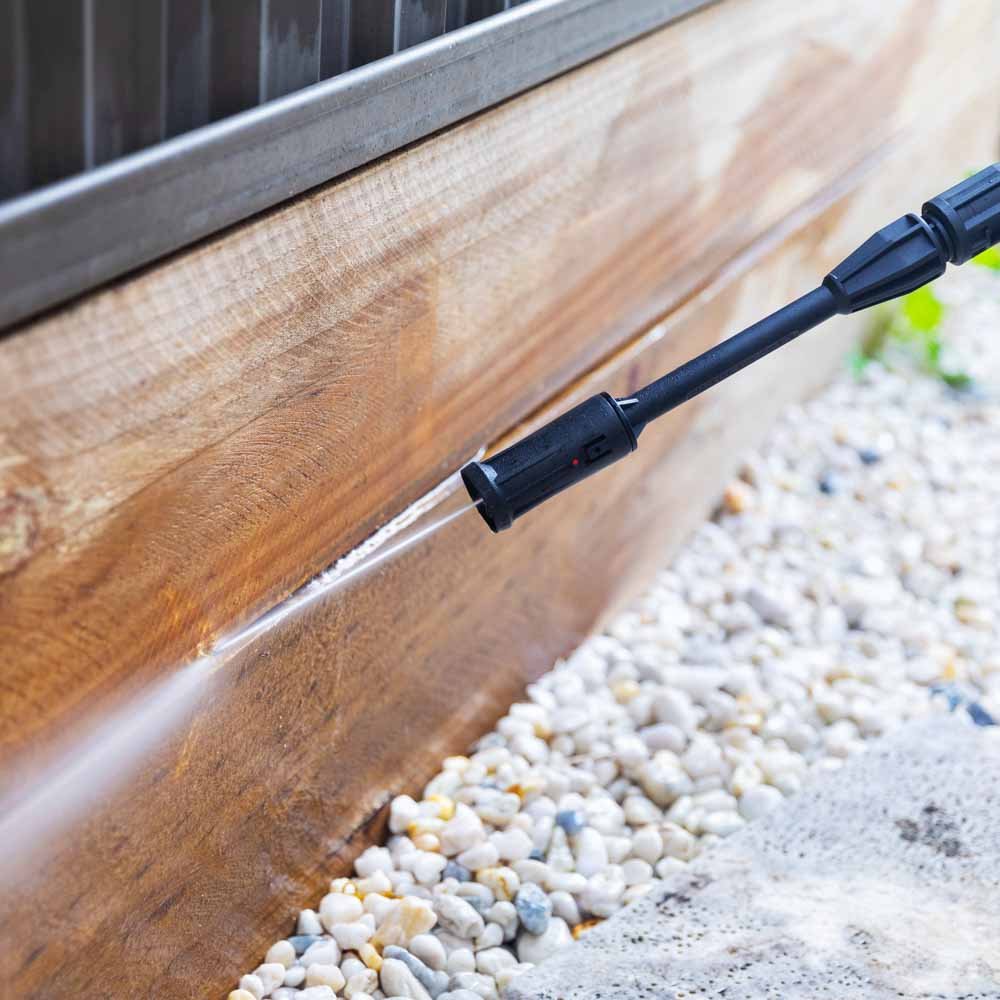 deck pressure washing team busy working